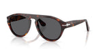 Sunglasses with tortoiseshell frame and dark lenses on a white background