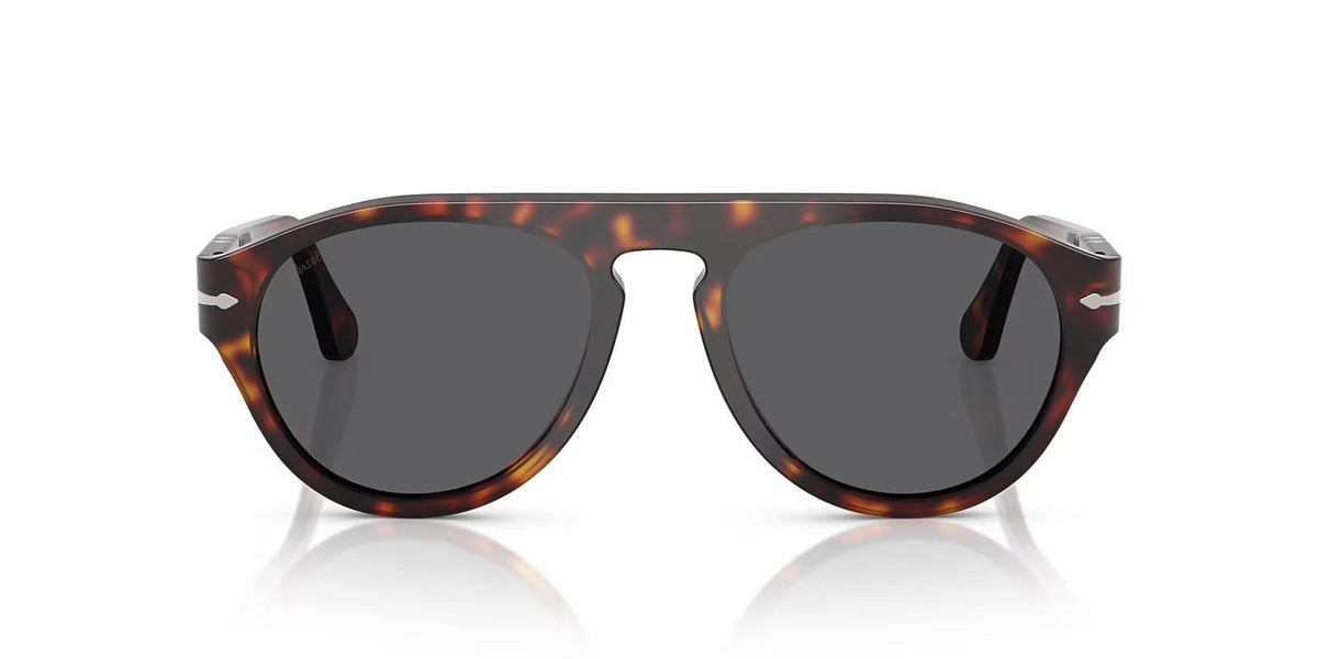 Tortoise sunglasses with dark lenses on a white background