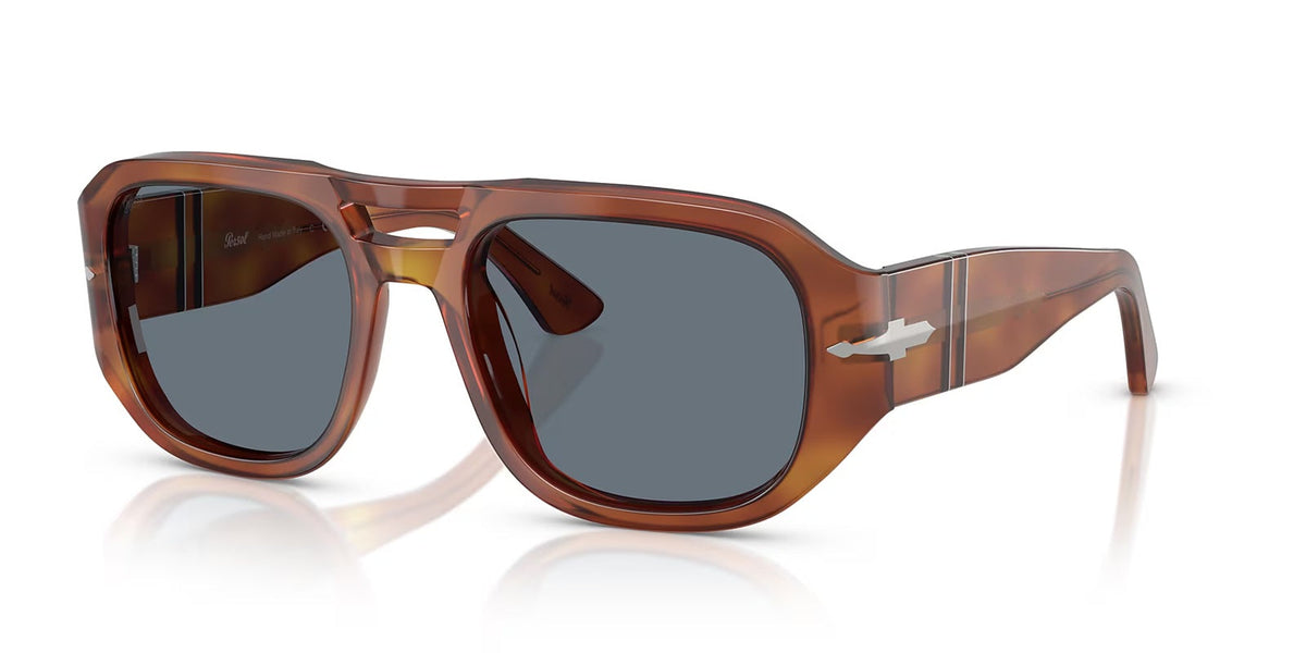 Brown sunglasses with dark lenses on a white background