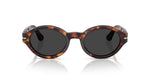 Sunglasses with tortoise frame and dark lenses on a white background