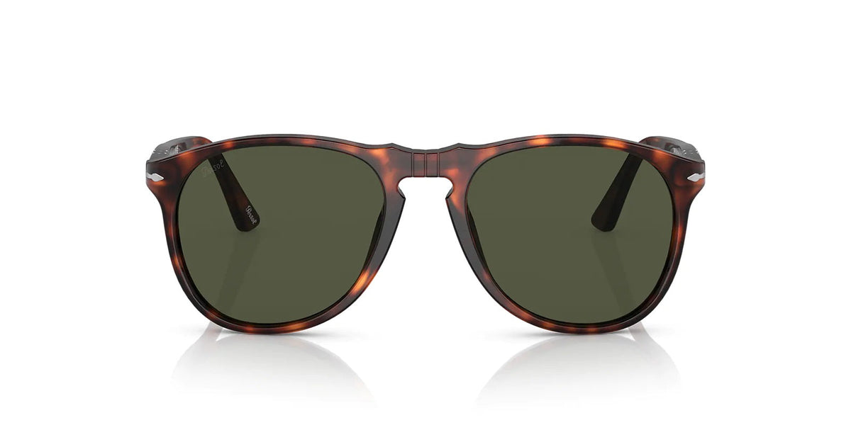 Sunglasses with tortoise frame and dark lenses on a white background