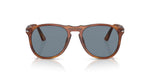Brown sunglasses with dark lenses on a white background