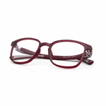 Red round eyeglasses on a white background