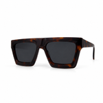 Sunglasses with brown frame and dark lenses on a white background