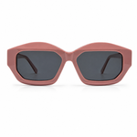 Sunglasses with a rose frame and dark lenses on a white background