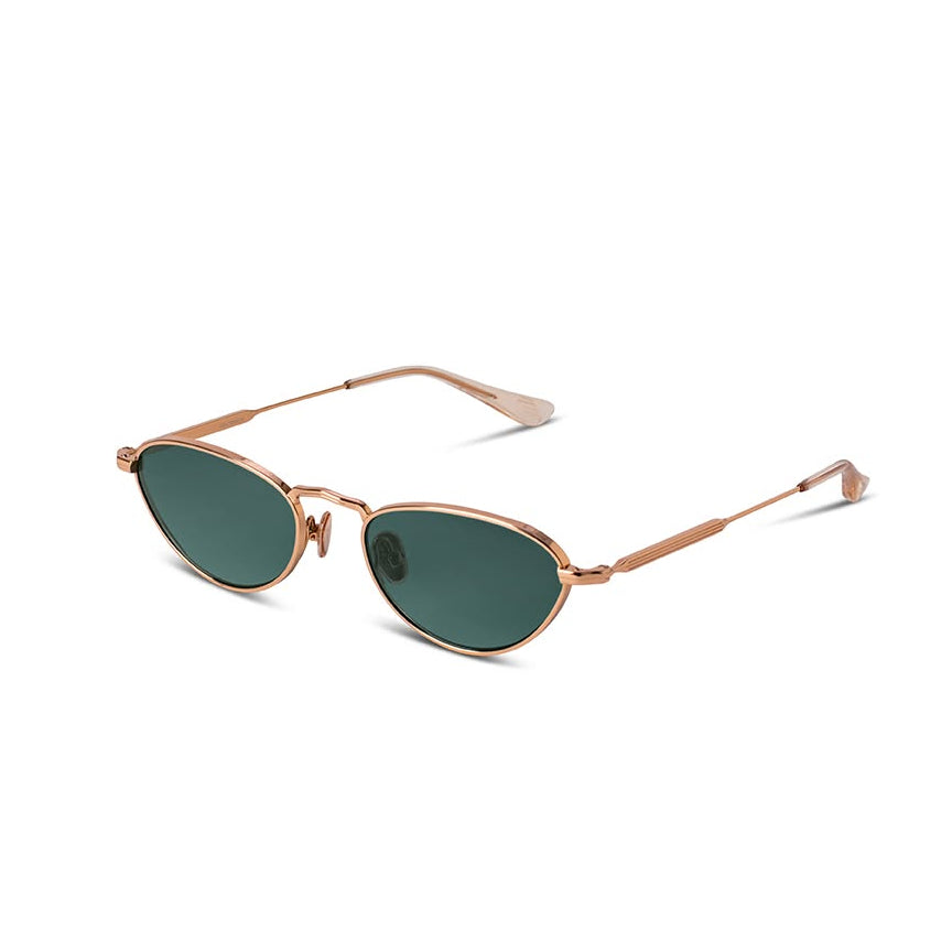 gold sunglasses with green lenses on a white background