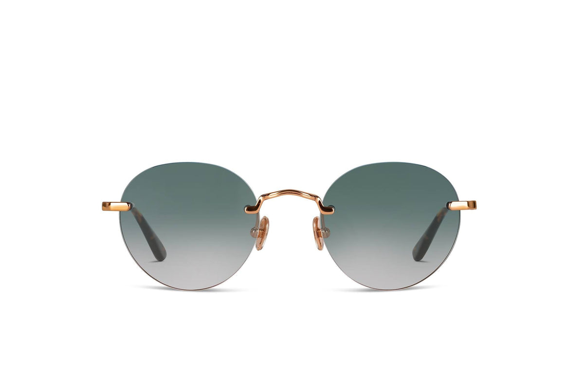 Round sunglasses with gradient lenses on a white background