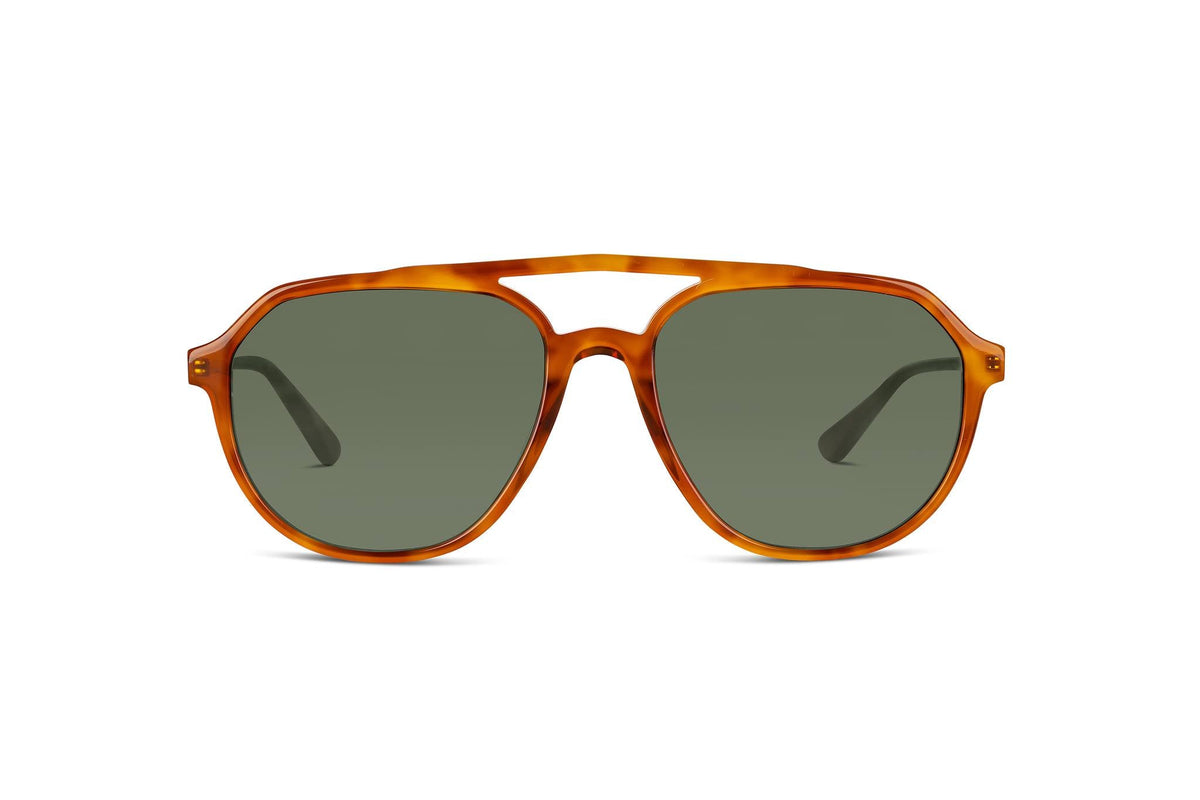Sunglasses with tortoiseshell aviator frame and dark lenses on a white background