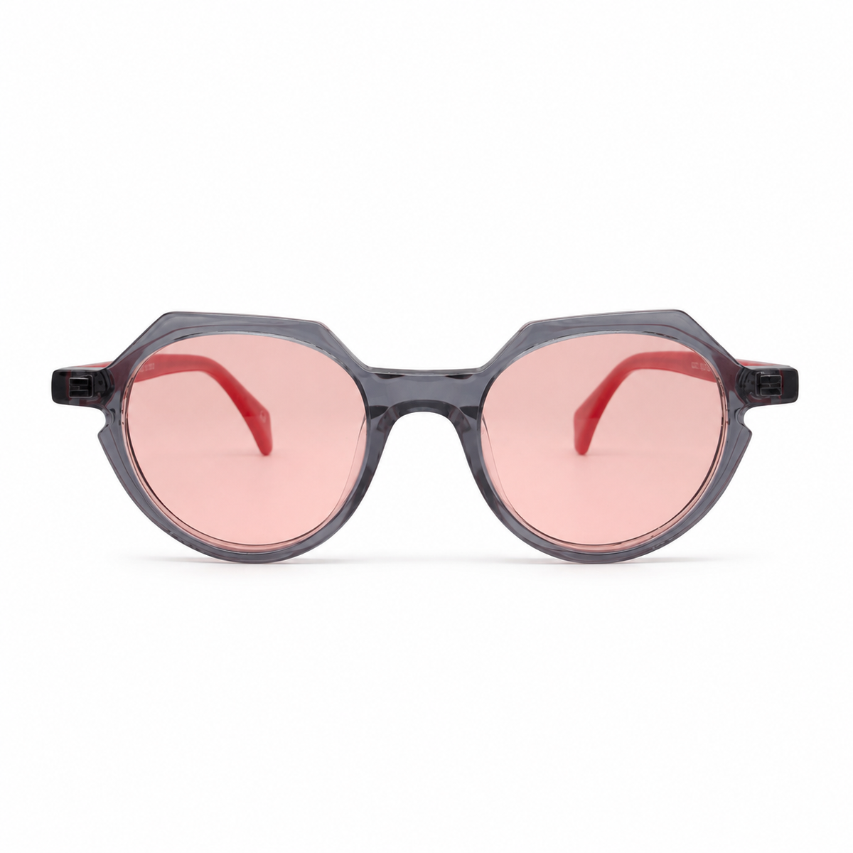Sunglasses with pink lenses and black frames on a white background