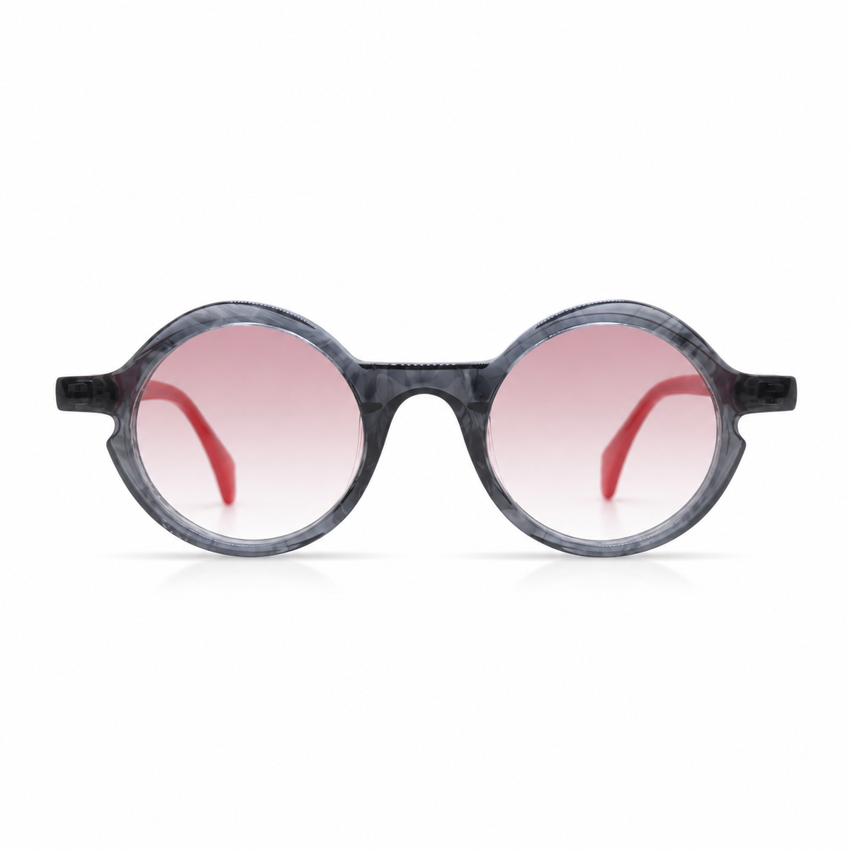 Round sunglasses with pink lenses on a white background