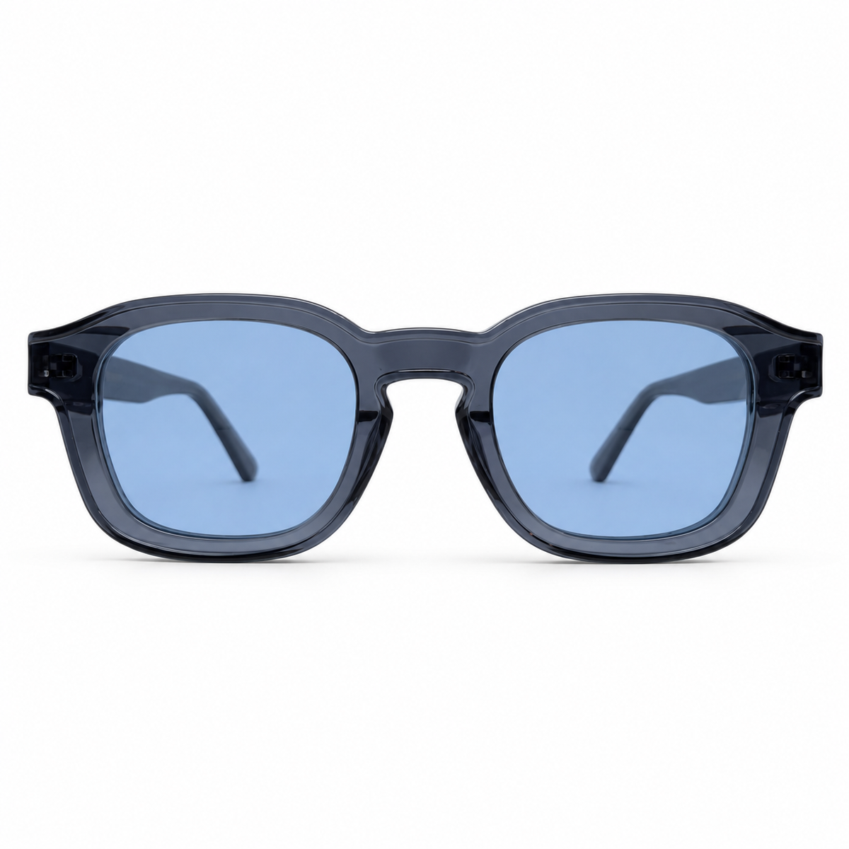 Sunglasses with blue lenses and dark frames on a white background