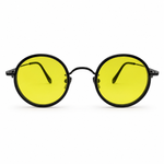 Round yellow-tinted sunglasses with black frames on a white background