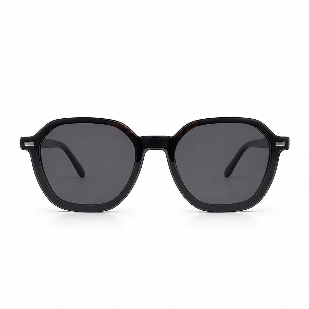 Black sunglasses with dark lenses on a white background
