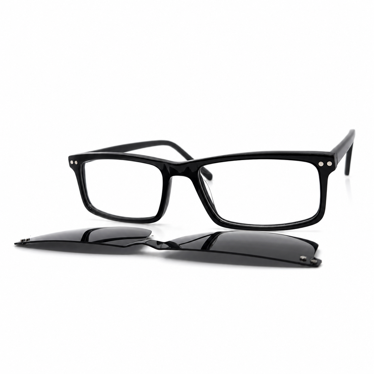 Black rectangular glasses with clip-ons on a white background