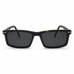Glasses with a tortoise frame and dark lenses on a white background
