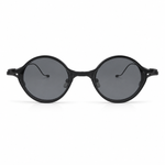 Black round sunglasses with dark lenses on a white background
