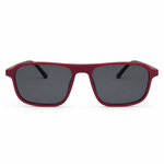 Red sunglasses with dark lenses and clip-on on a white background