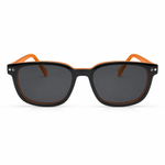 Glasses with black lenses and orange frames on a white background