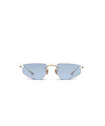 Front angle of gold framed sunglasses with blue lenses on a white background. 