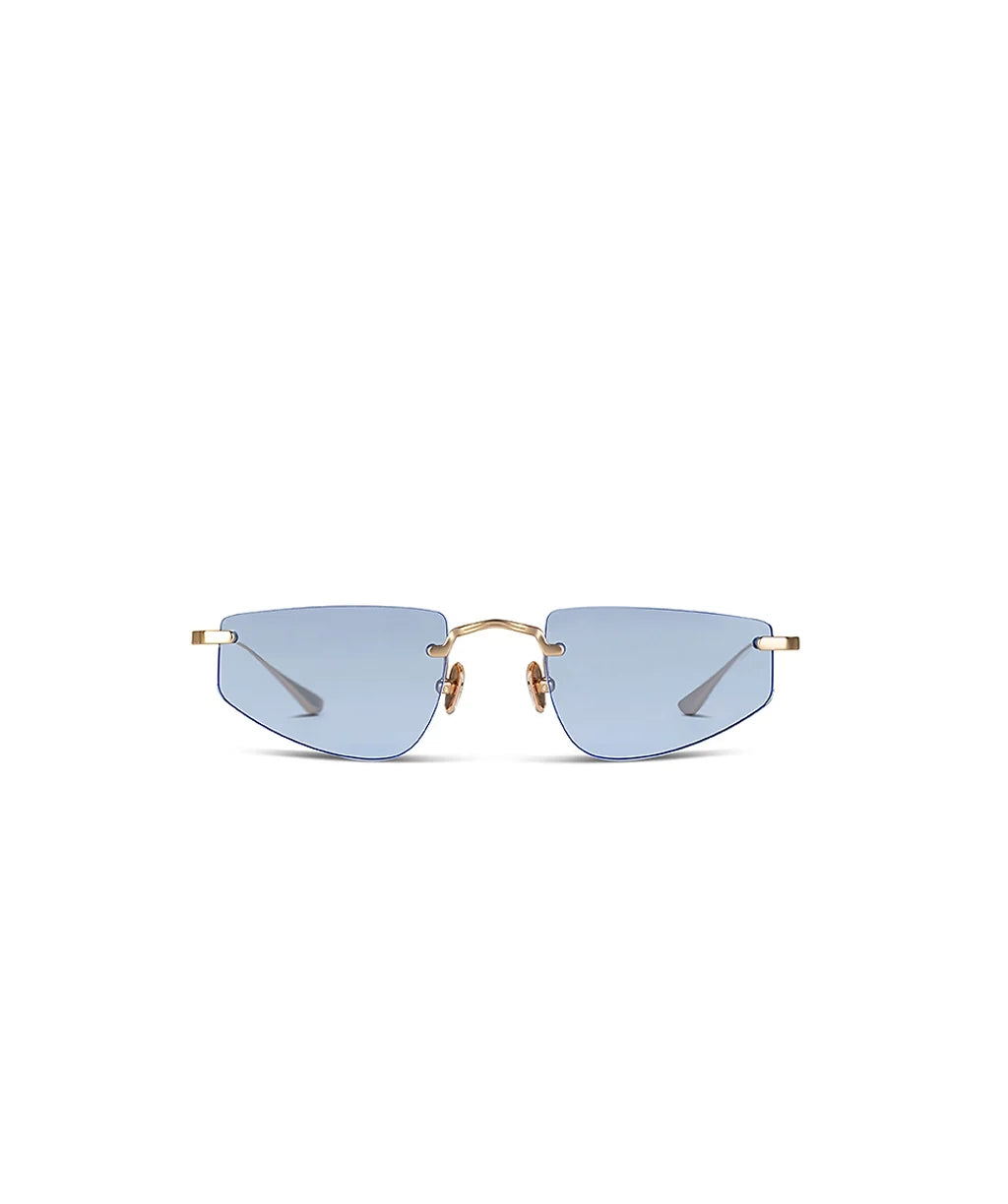 Front angle of gold framed sunglasses with blue lenses on a white background. 
