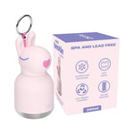 A pink bunny-shaped insulated bottle with a metal key ring attached, shown next to its retail box. The box is light pink with purple text and icons highlighting features like BPA and lead-free, 24-hour cold retention, soft touch, eco-friendly, and vacuum insulation, and is labeled 200ml.