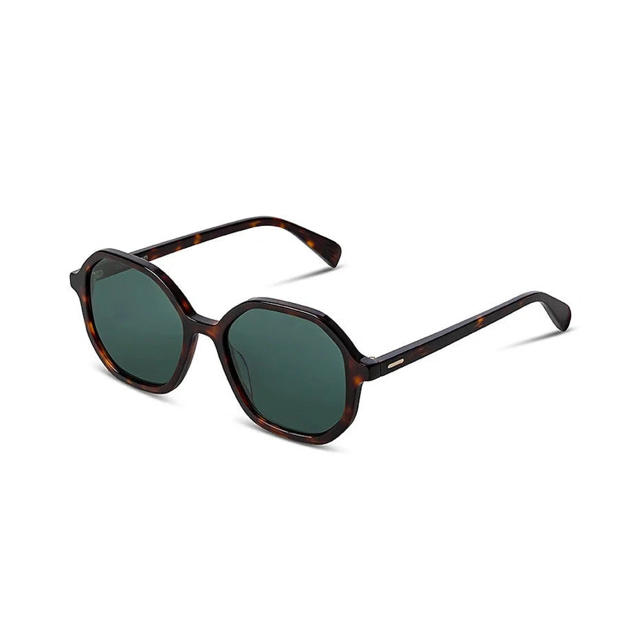 Sunglasses with tortoiseshell frame and dark lenses on a white background