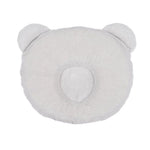 White Candide P'tit Panda ergonomic baby pillow made with organic cotton and memory foam.