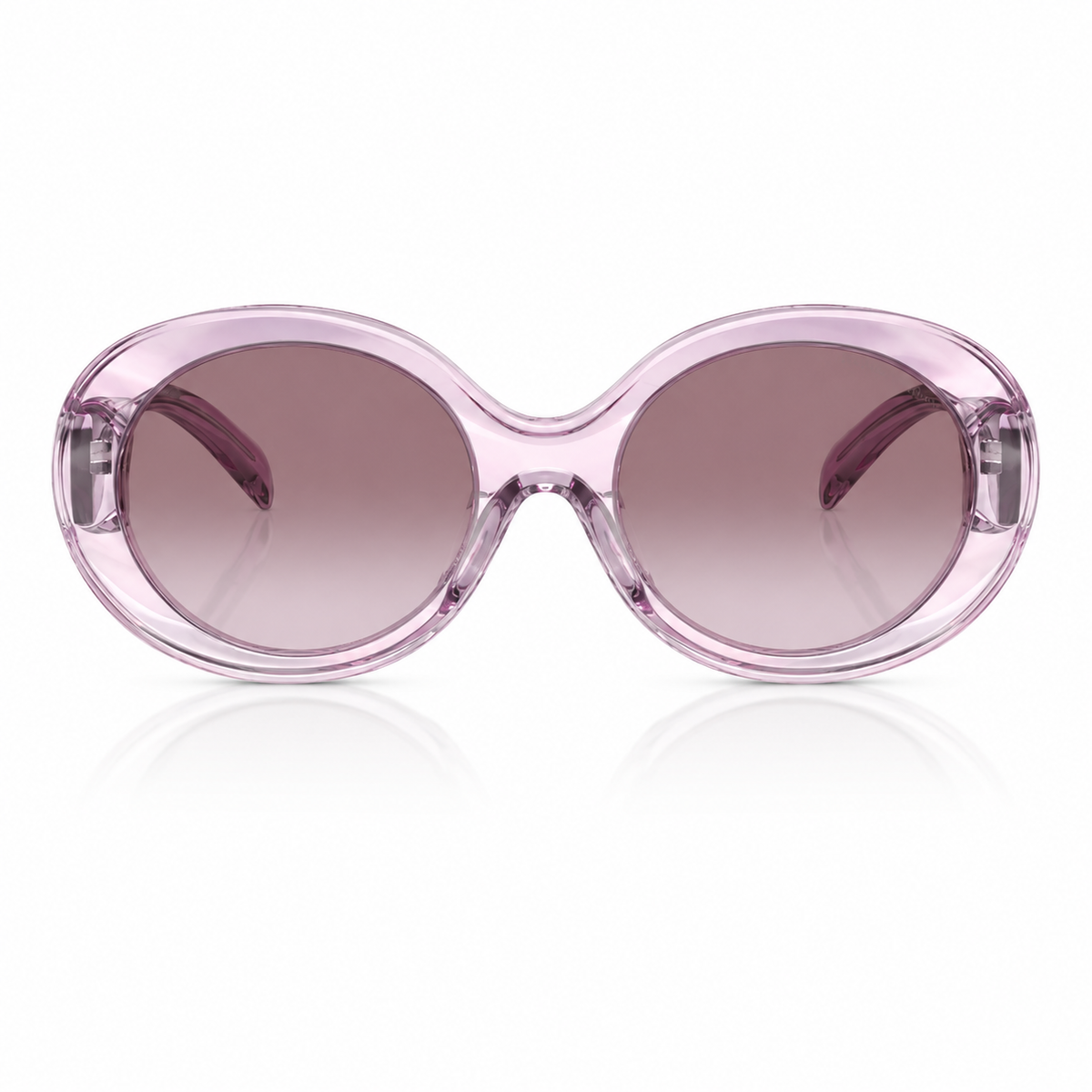 Oversized sunglasses with a translucent light pink frame and gradient-tinted lenses, shown on a clean white background with a soft reflection.