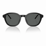 A pair of round-frame sunglasses with a glossy black acetate frame and dark gray lenses, shown from the front on a white background with a soft reflection below.