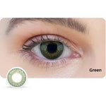 Close-up of an eye wearing green contact lenses with a small inset showing the lens itself.