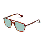 Sunglasses with tortoiseshell frame and light blue lenses on a white background