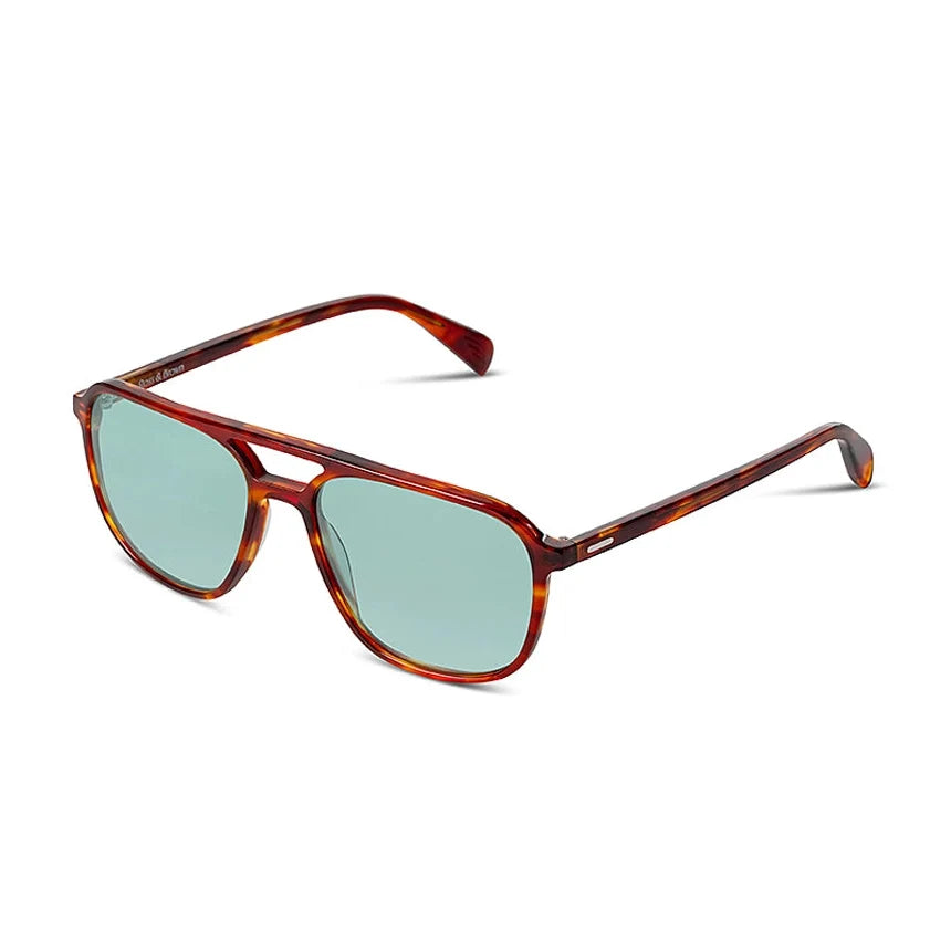Sunglasses with tortoiseshell frame and light blue lenses on a white background