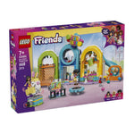 LEGO Friends 43686 Two included playsets box, showing a colorful children's playset scene with multiple mini-dolls, toys, and bright architectural play areas on a purple LEGO Friends branded box.