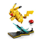 A yellow Pikachu-style building block figure with black-tipped ears and tail, red cheeks, and a floating red-and-white Pokéball accessory above a black display base with a translucent teal blade effect, on a white background.