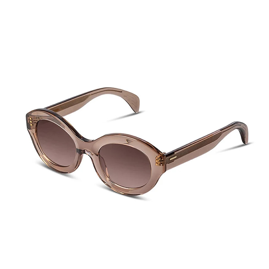 Champagne colored sunglasses with gradient lenses on a white background