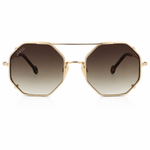 Hexagonal aviator-style sunglasses with a gold metal frame and gradient brown lenses, shown against a plain white background.