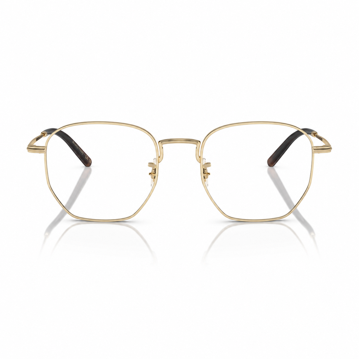 Gold metal eyeglass frames with a thin hexagonal shape and dark brown acetate temple tips, shown on a clean white background with a soft reflection.