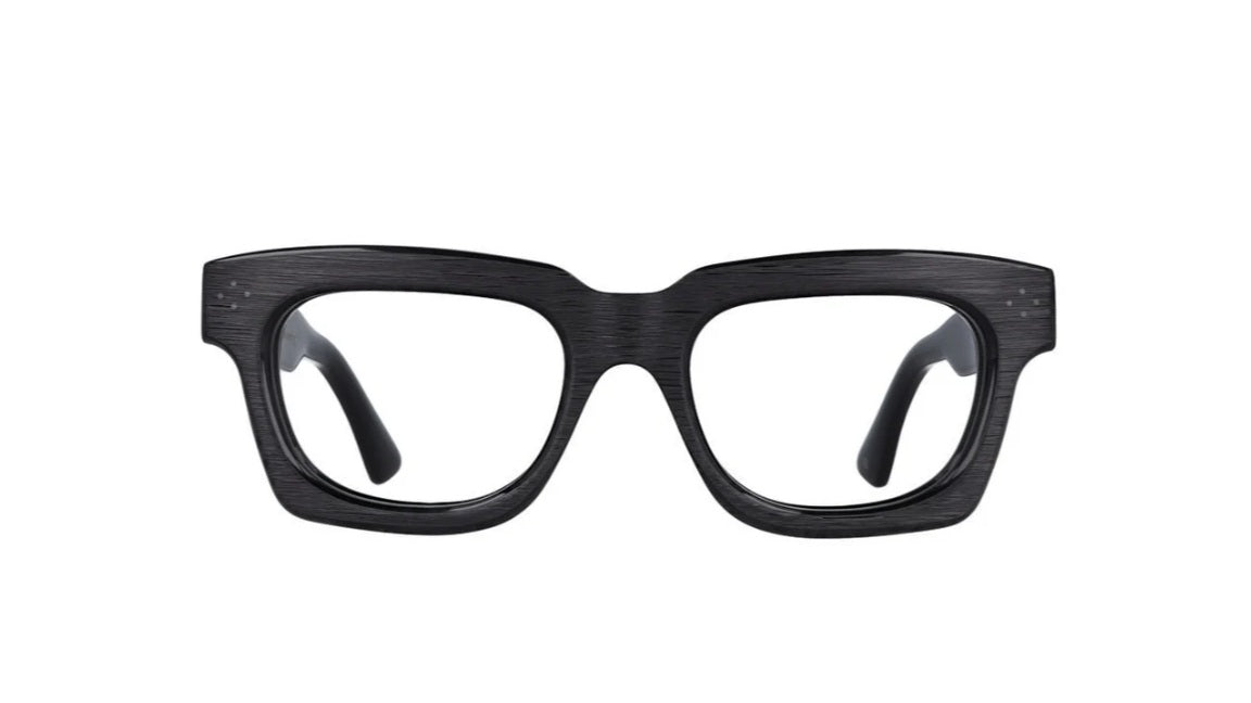 Black thick eyeglasses on a white background