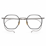 A pair of metal eyeglass frames , featuring a silver outer frame and thin silver inner metal bars. 