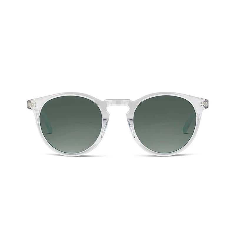 Round sunglasses with a translucent white frame and dark lenses, shown from the front on a plain white background.
