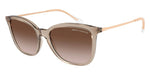 Light brown cat-eye glasses on a white background. 
