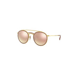 Gold  sunglasses with pink mirror lenses on a white background