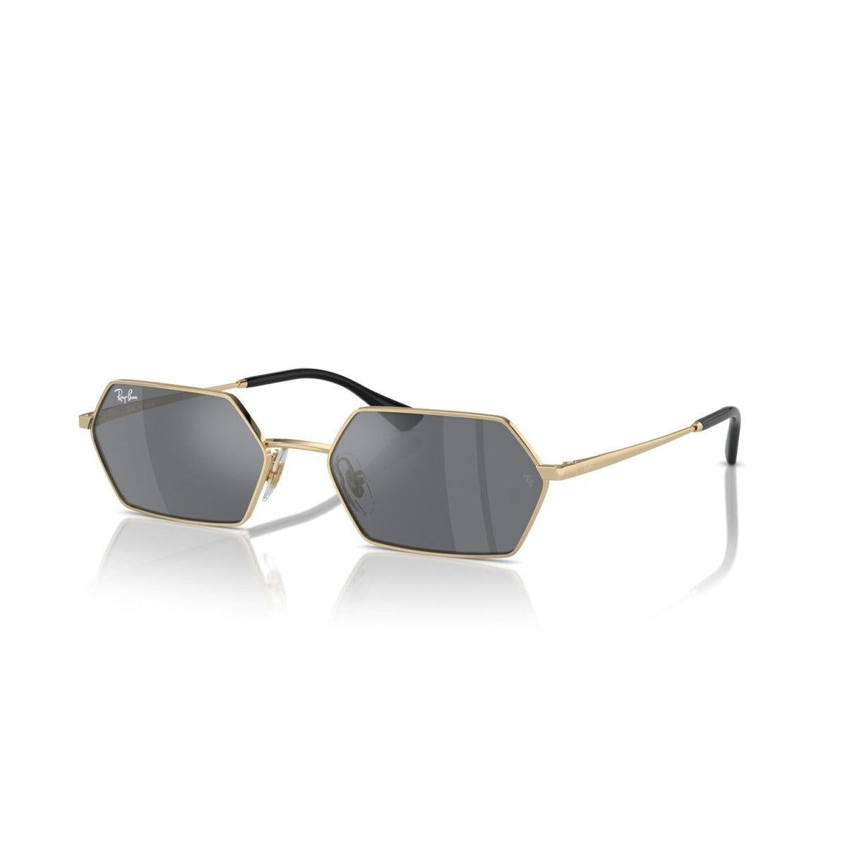 Bronze hexagonal sunglasses with dark lenses on a white background