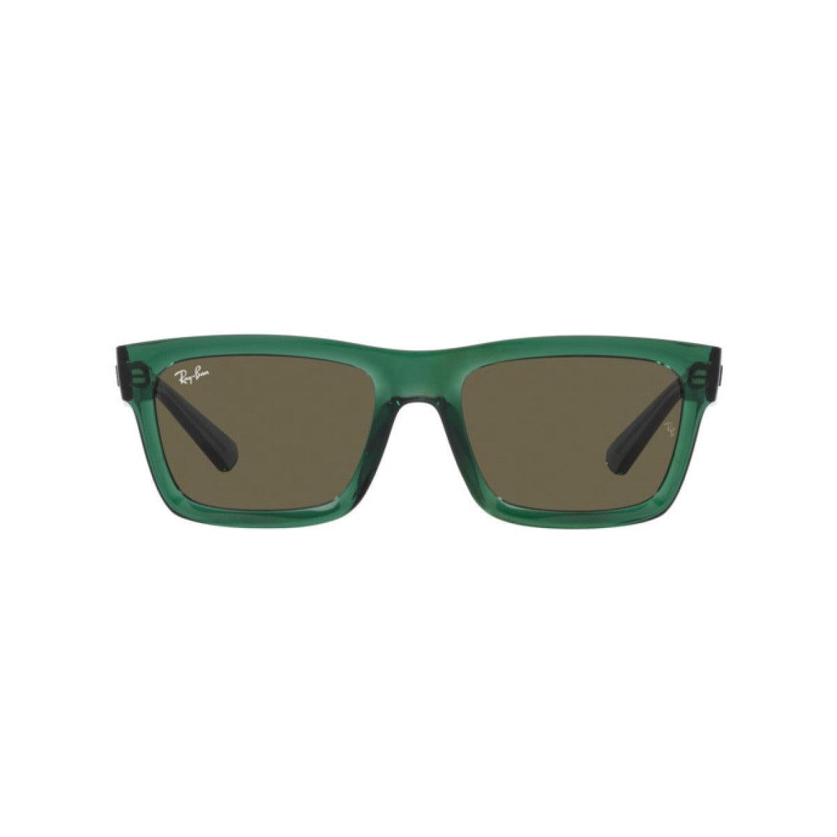 Green sunglasses with brown lenses on a white background