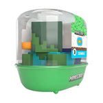 Minecraft Zombie toy figure in a clear dome container with a green base, shown on a white background. The packaging label reads Minecraft, Year 3, and Zombie.