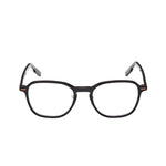 Black eyeglasses on a white background. 