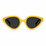 Yellow oversize sunglasses with black lenses on a white background